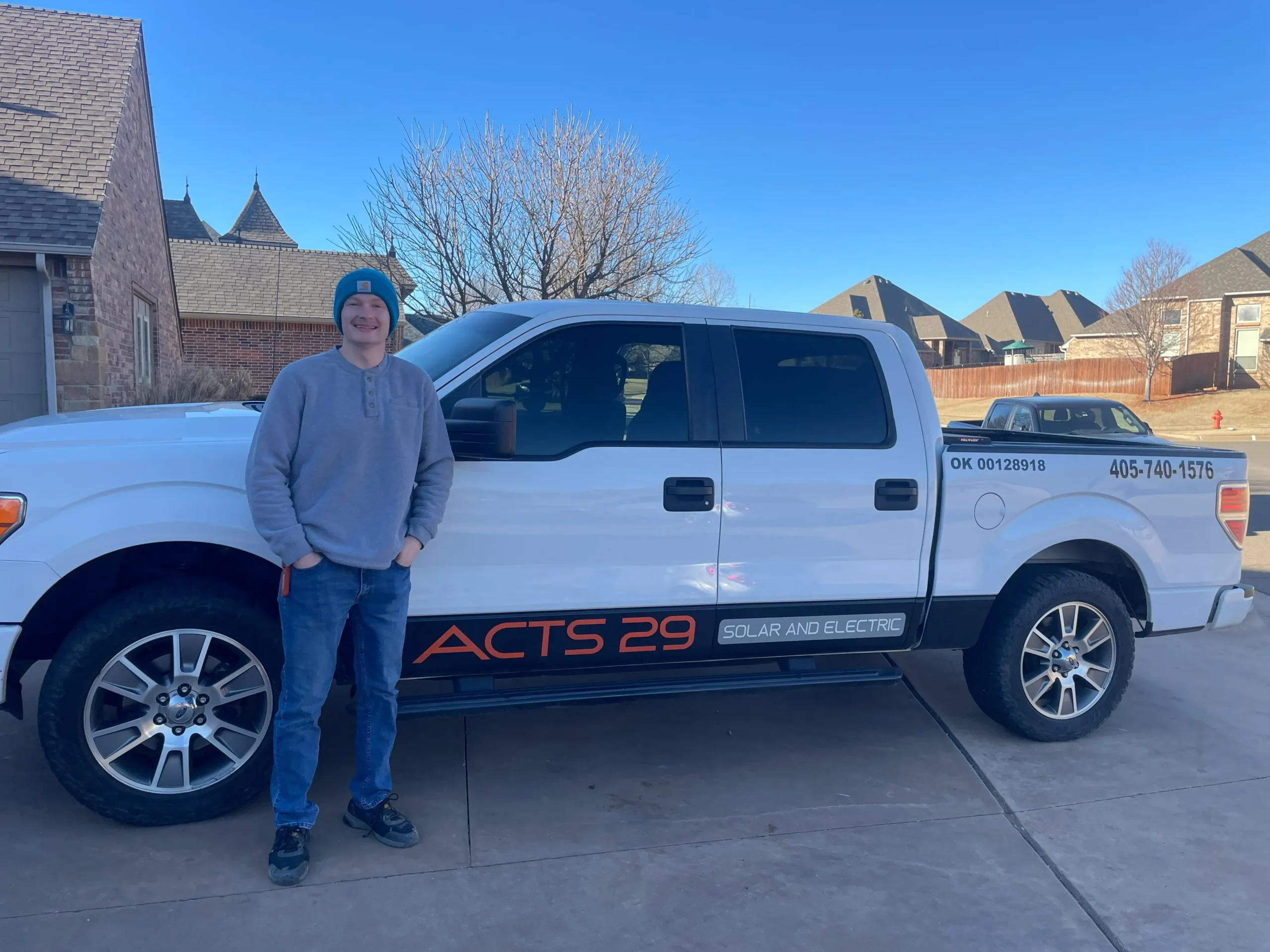 acts 29 crew member arrives in his work truck ready for a solar day